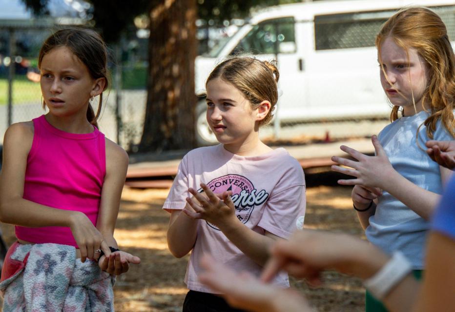 Kids playing a ice breaker game